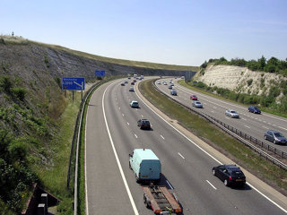 A motorway cutting through the land