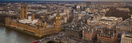 Aerial view of London with Houses of Parliament and Westminster Bridge.