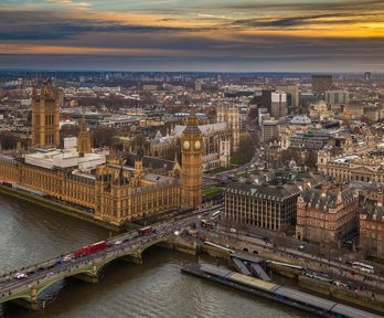 Aerial view of London with Houses of Parliament and Westminster Bridge.