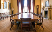 A large wooden table setup for a boardroom meeting in the Council Room at the Society.