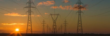 Electricity pylons stretching out into the distance