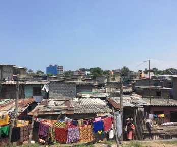 A settlement with colourful washing hanging up