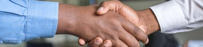 Close up of two people shaking hands