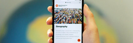 A smartphone screen displaying the Geography page of the Society's website.