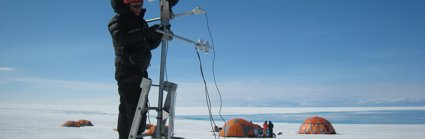 Person operating scientific equipment in polar environment