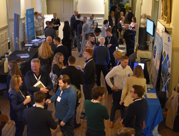 Conference attendees networking in the Society's Main Hall 