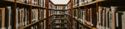 Shelves with books in an archive.